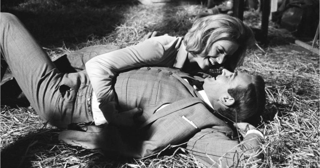 Honor Blackman tickles Sean Connery